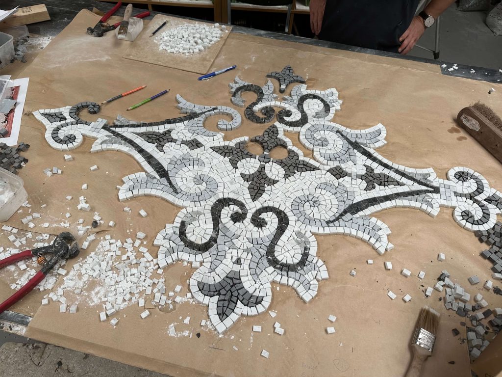 New bespoke marble mosaic using a mix of white Carrara and three different tones of grey