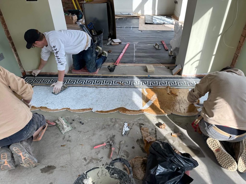 New marble mosaic and geometric tile installations completed in Market Harborough. team at work