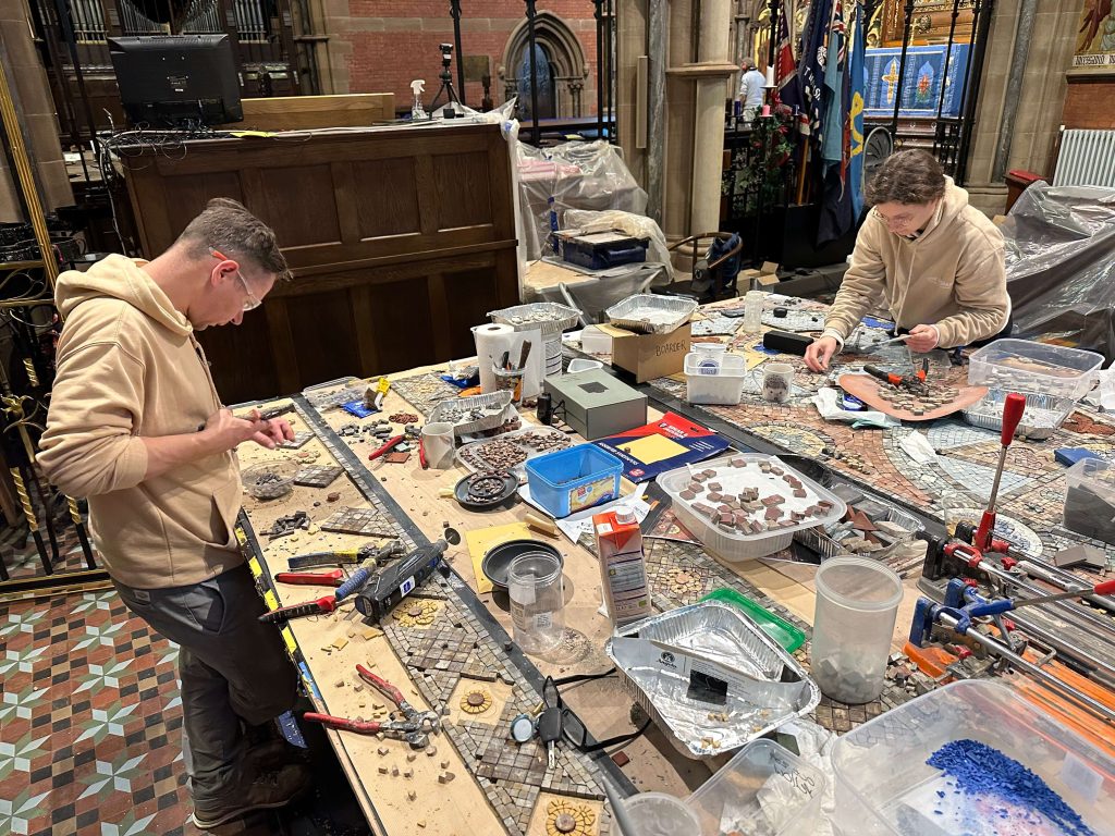lifting damaged and restore mosaic tesserae Bury Church - team in workshop