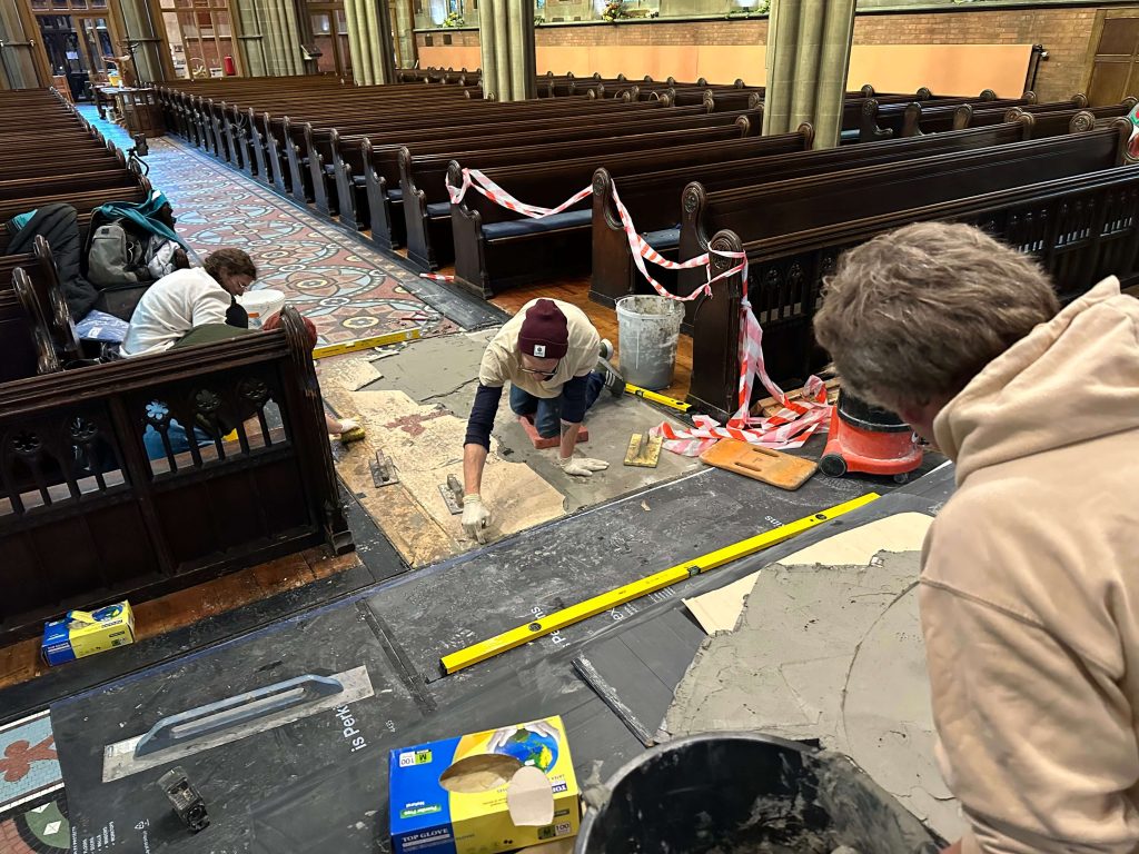 lifting damaged and restore mosaic tesserae Bury Church in progress